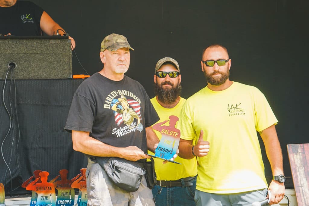 a group of men posing for a picture