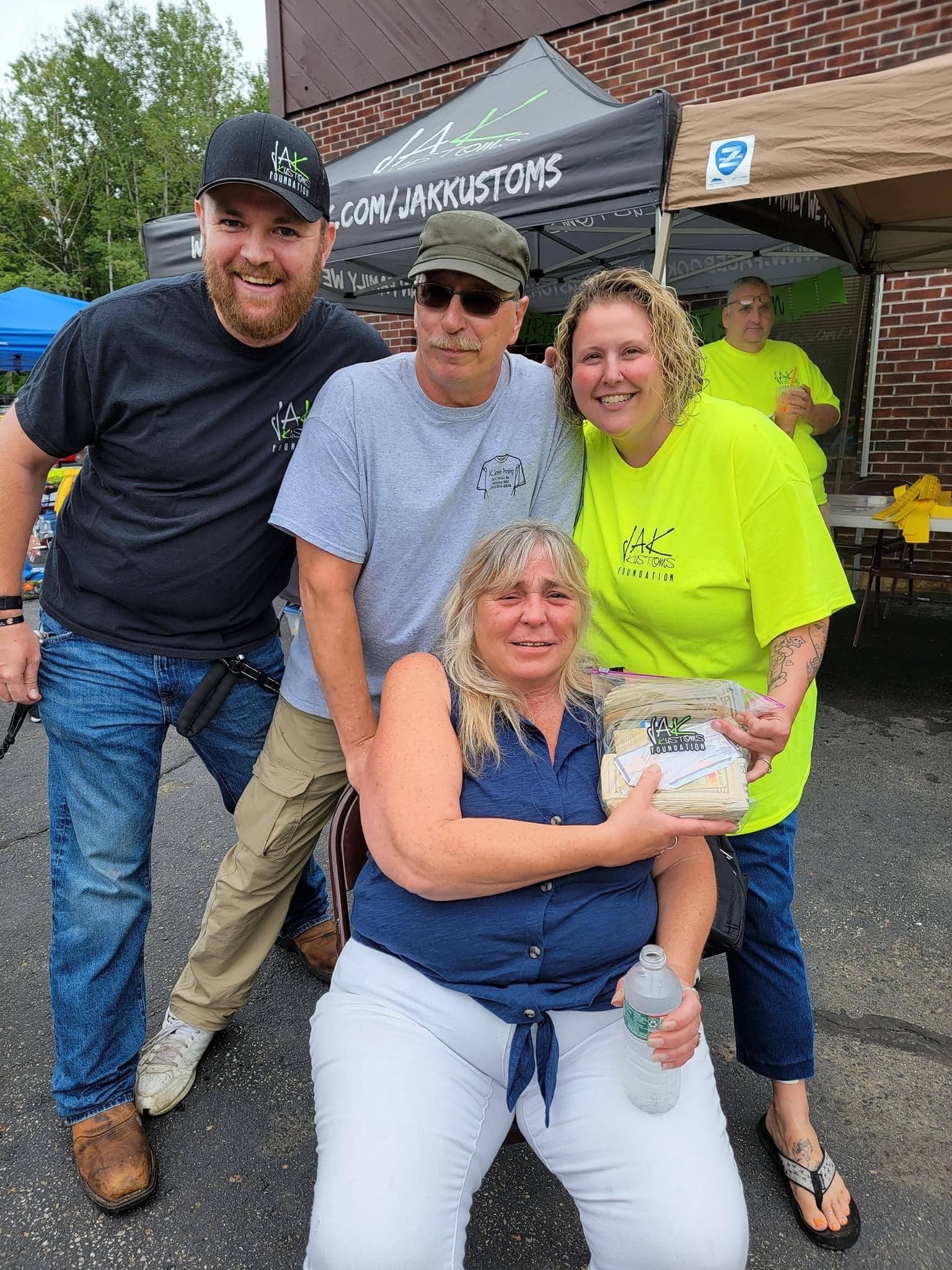 beneficiaries Bernie and Carol with VP Crystal and volunteer Jim