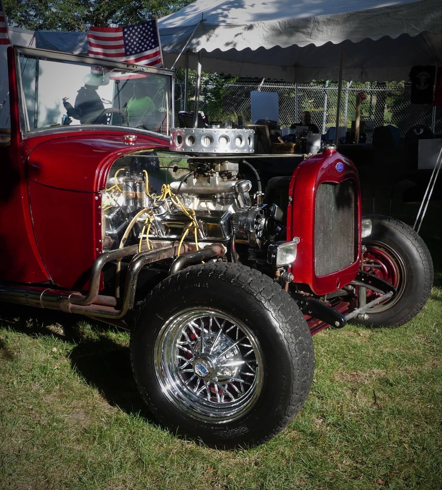 a red tractor on grass